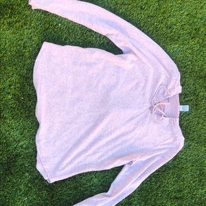 Isela sports sweater.